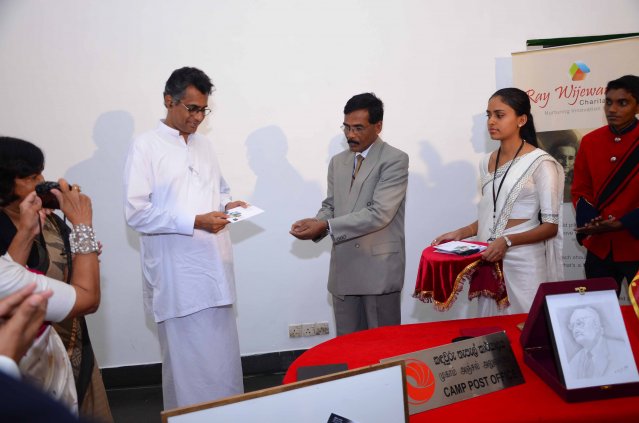 Presenting the First Day Cover and Stamp to Minister of Technology and Research, Patali Champika Ranawaka